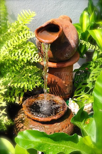 tao-thac-nuoc-goc-vuon-bang-gom